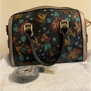 Hand painted floral embossed leather purse. NWOT